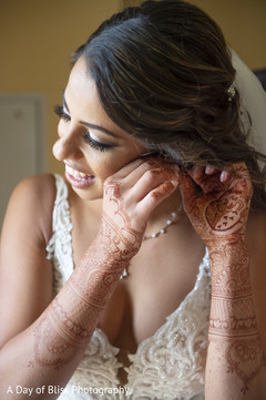 Indian bride getting ready with her jewelry Indian bride getting ready with her jewelry