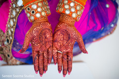 Indian bride showing her beautiful mehndi design Indian bride showing her beautiful mehndi design