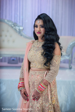 Indian bride staring at the camera during pictures Indian bride staring at the camera during pictures