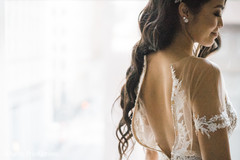 Maharani putting her white dress on. Maharani putting her white dress on.