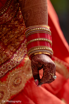 Stunning Indian bridal henna art and bangles close up. Stunning Indian bridal henna art and bangles close up.