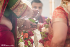 Indian couple making offerings to sacred fire. Indian couple making offerings to sacred fire.