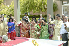 Indian wedding guest saying goodbye to newly weds. Indian wedding guest saying goodbye to newly weds.