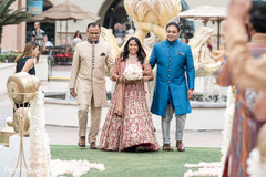 See this dazzling Indian bride escorted by her family See this dazzling Indian bride escorted by her family
