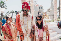 Joyful Indian couple leaving the venue Joyful Indian couple leaving the venue
