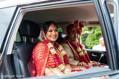 Indian bride and groom at their ride Indian bride and groom at their ride