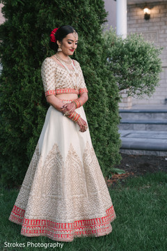 Stunning Indian bride posing for pictures outside Stunning Indian bride posing for pictures outside