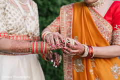 Maharani being assisted by special guest with the jewelry Maharani being assisted by special guest with the jewelry