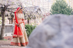 Indian bride outdoors by the park Indian bride outdoors by the park