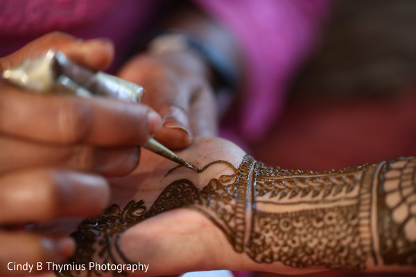 Closeup capture of Indian bridal mehndi art.