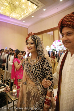 Maharani entering her wedding ceremony with relative. Maharani entering her wedding ceremony with relative.