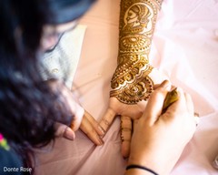 Incredible Indian bridal henna art being done. Incredible Indian bridal henna art being done.
