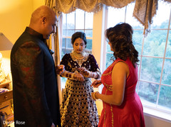 Maharani putting her bangles on. Maharani putting her bangles on.