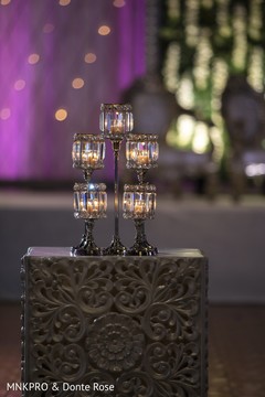Elegant Indian wedding candle holders decor. Elegant Indian wedding candle holders decor.
