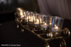 Elegant Indian wedding reception candle decor. Elegant Indian wedding reception candle decor.