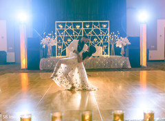 Indian bride and groom dancing at the reception Indian bride and groom dancing at the reception