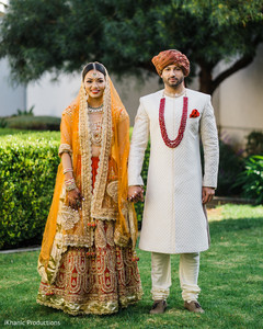 Lovely Indian couple out in garden capture. Lovely Indian couple out in garden capture.