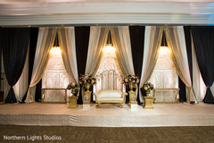 Impressive Indian wedding reception stage decor. Impressive Indian wedding reception stage decor.