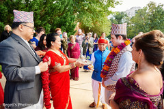 Indian groom arriving and being greeted by maharani's family Indian groom arriving and being greeted by maharani's family