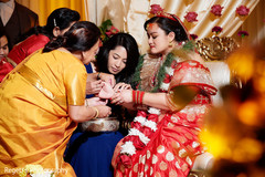 Maharani being assisted during one of the rituals Maharani being assisted during one of the rituals