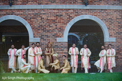 Indian groom posing with groomsmen Indian groom posing with groomsmen