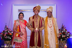 Indian groom making his entrance with family Indian groom making his entrance with family
