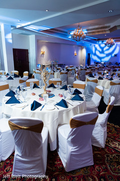 Elegant Indian wedding reception table setup. Elegant Indian wedding reception table setup.
