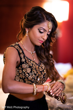 Lovely Indian bride getting her brazaletes on. Lovely Indian bride getting her brazaletes on.