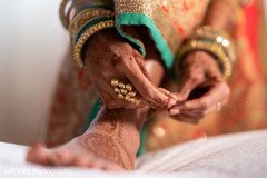 Maharani putting her anklets on. Maharani putting her anklets on.