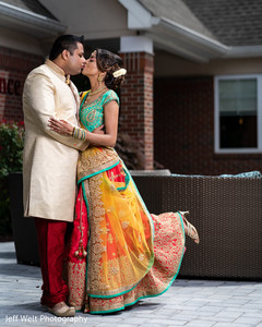 Enchanting Indian lovebirds on their ceremony outfits. Enchanting Indian lovebirds on their ceremony outfits.