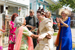 Indian groom having a great time during baraat Indian groom having a great time during baraat