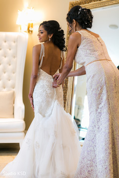 Beautiful Maharani being assisted with her gown Beautiful Maharani being assisted with her gown