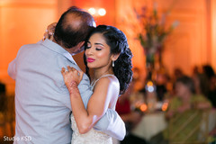Indian bride dancing with her father Indian bride dancing with her father