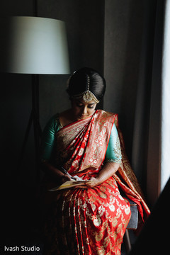 Lovely Indian bride writing her vows. Lovely Indian bride writing her vows.