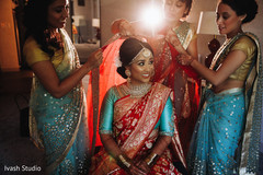 Indian bride getting her wedding veil on. Indian bride getting her wedding veil on.