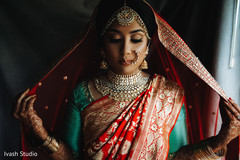 Glamorous Indian bride on her wedding ceremony outfit. Glamorous Indian bride on her wedding ceremony outfit.