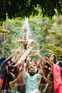 Fun moment of Indian groom with bridesmaids. Fun moment of Indian groom with bridesmaids.