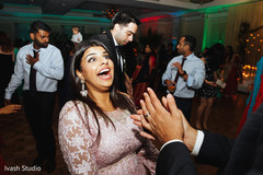 Joyful indian bridesmaid showing some dance moves Joyful indian bridesmaid showing some dance moves