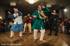 Indian groom and groomsmen sangeet dance photo. Indian groom and groomsmen sangeet dance photo.