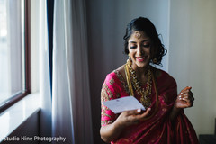 Maharani reading rajah's note. Maharani reading rajah's note.