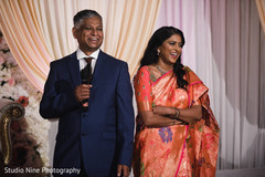 Indian wedding reception speech moment capture. Indian wedding reception speech moment capture.