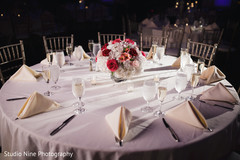 Elegant Indian wedding reception table setup. Elegant Indian wedding reception table setup.