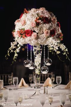 Magnificent Indian wedding table centerpiece flowers decor. Magnificent Indian wedding table centerpiece flowers decor.