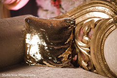 Elegant Indian wedding golden couch pillow. Elegant Indian wedding golden couch pillow.