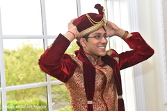 Indian groom putting his turban on. Indian groom putting his turban on.