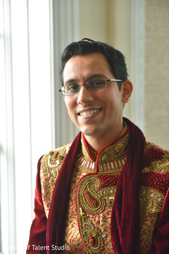 Charming Indian groom getting ready. Charming Indian groom getting ready.