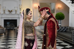 Sweet and lovely Indian bride and groom's first look scene. Sweet and lovely Indian bride and groom's first look scene.