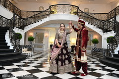 Indian bride and groom's romantic first look moment. Indian bride and groom's romantic first look moment.