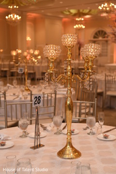 Unique Indian wedding reception table centerpiece. Unique Indian wedding reception table centerpiece.