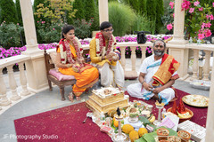 Indian wedding priest during ceremony. Indian wedding priest during ceremony.